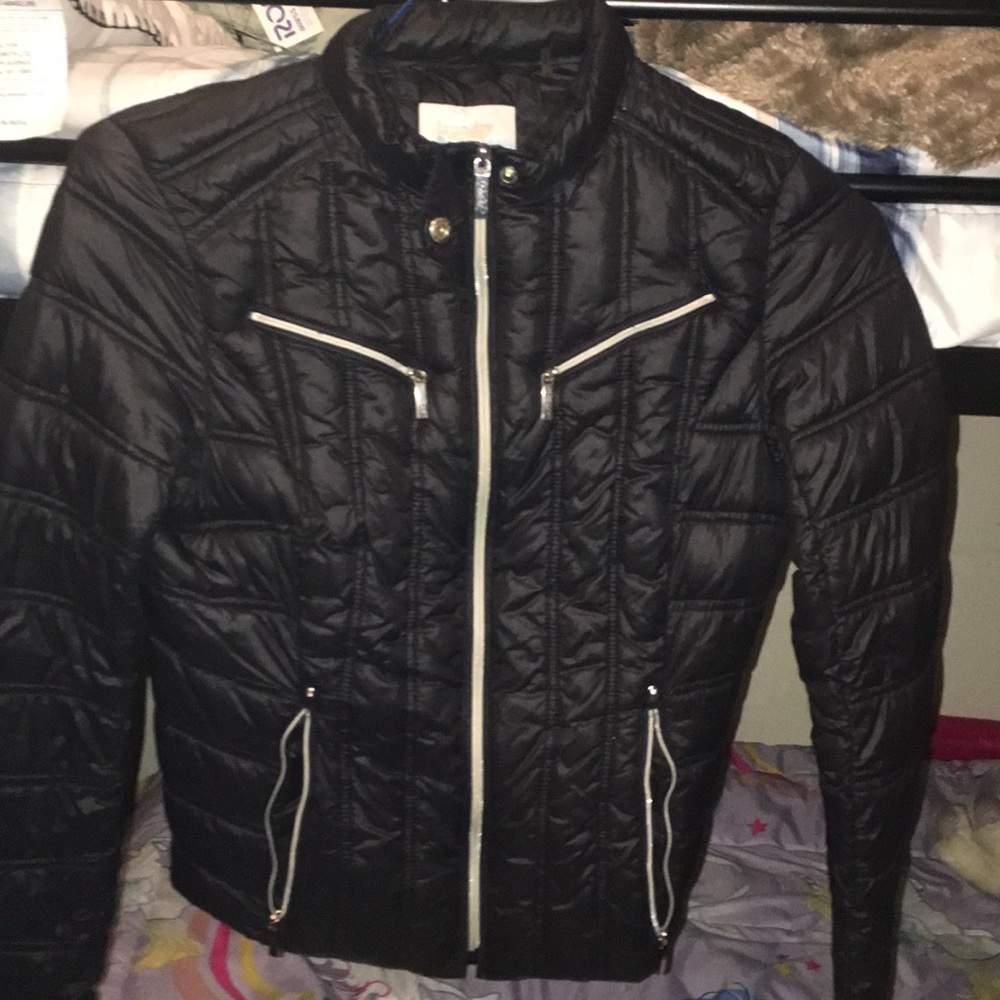 A Bubble Jacket With 4 Zippers In The Front.